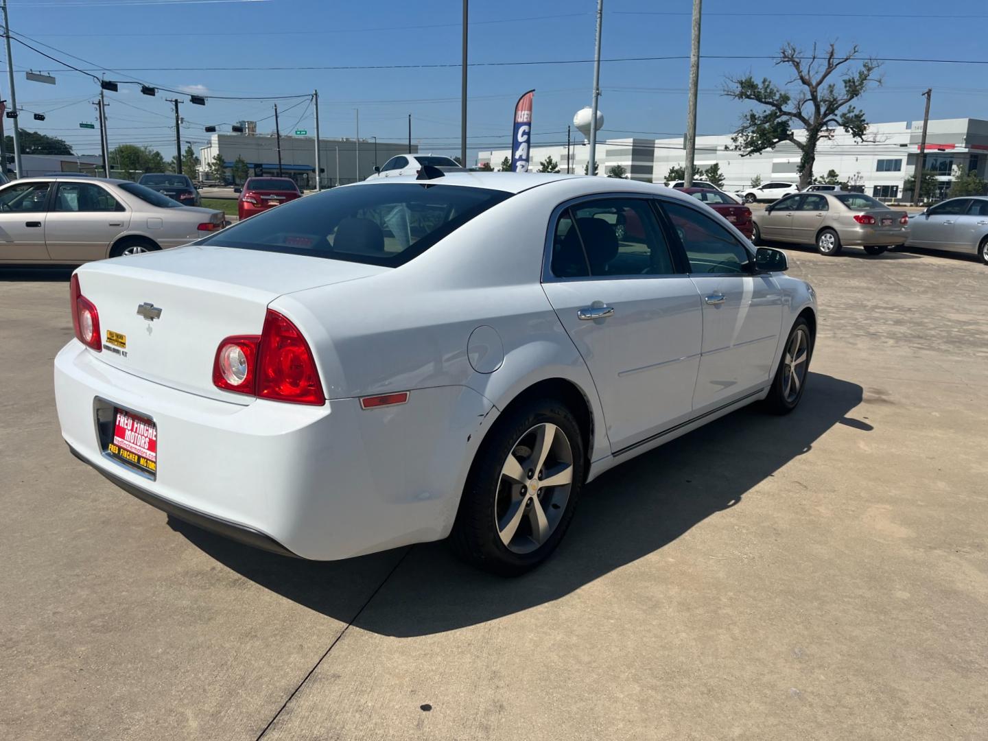 2012 white /black Chevrolet Malibu 1LT (1G1ZC5EU4CF) with an 2.4L L4 DOHC 16V FFV engine, 6-Speed Automatic transmission, located at 14700 Tomball Parkway 249, Houston, TX, 77086, (281) 444-2200, 29.928619, -95.504074 - Photo#6